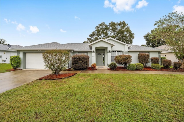 ranch-style house with a front lawn and a garage