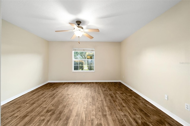 unfurnished room featuring hardwood / wood-style flooring, ceiling fan, and a textured ceiling