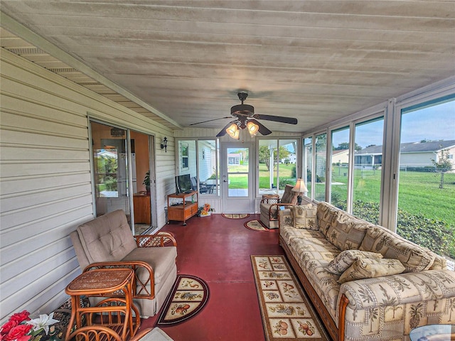 sunroom / solarium with ceiling fan and a wealth of natural light