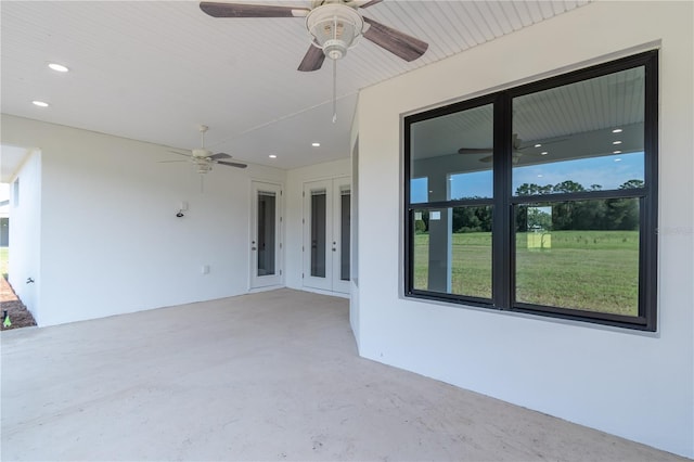 view of patio featuring ceiling fan