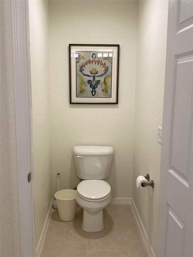 5900 NW 59th Ct, Ocala, FL 34482 - bathroom featuring tile patterned floors and toilet