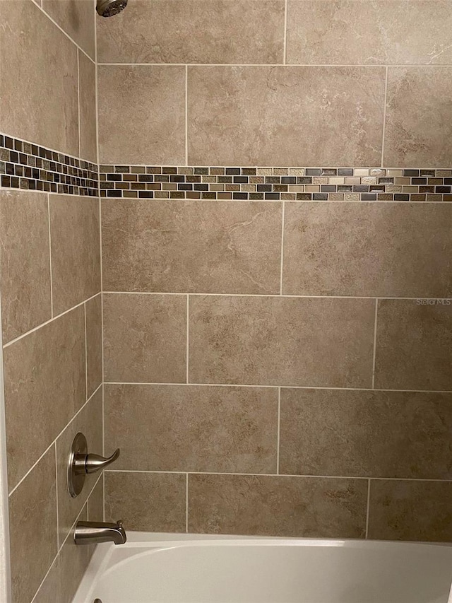 5900 NW 59th Ct, Ocala, FL 34482 - details with tiled shower / bath combo
