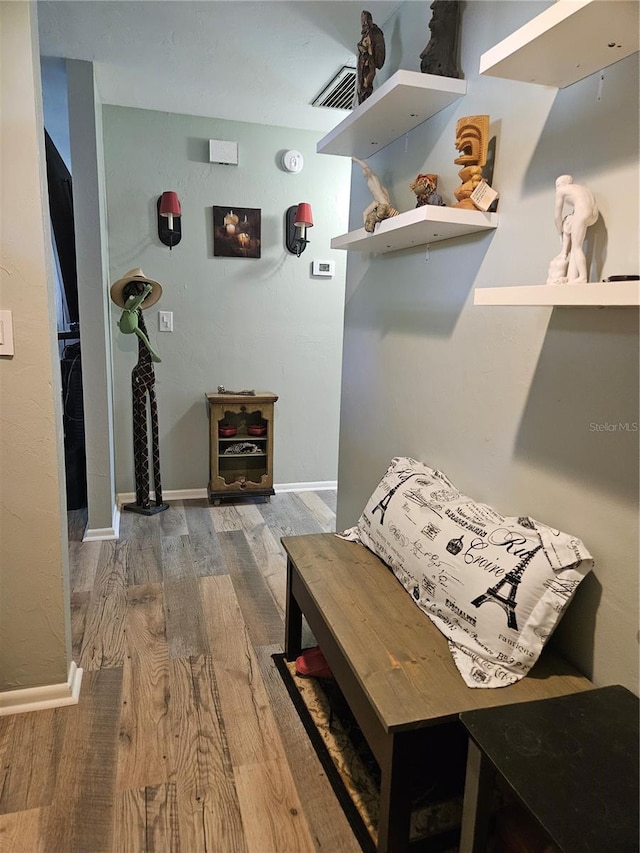 interior space with hardwood / wood-style floors