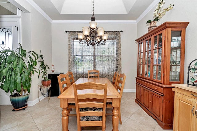 tiled dining space featuring an inviting chandelier and crown molding