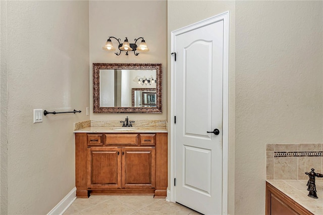 bathroom with vanity and tile patterned floors