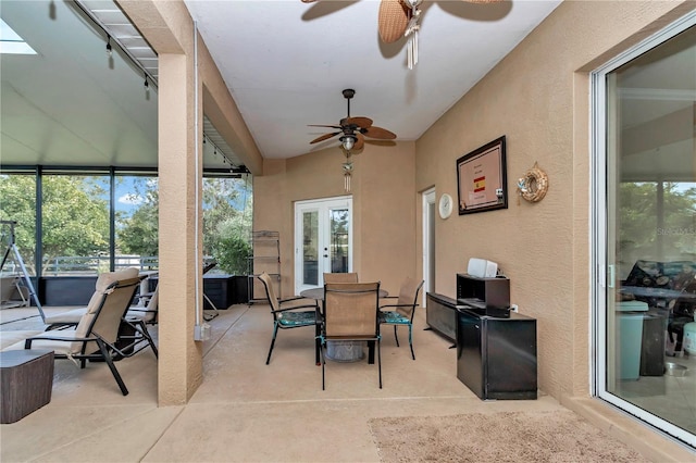 sunroom with french doors and ceiling fan