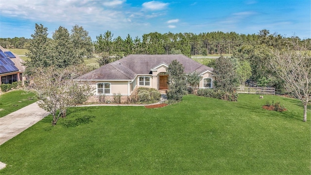 ranch-style house with a front lawn