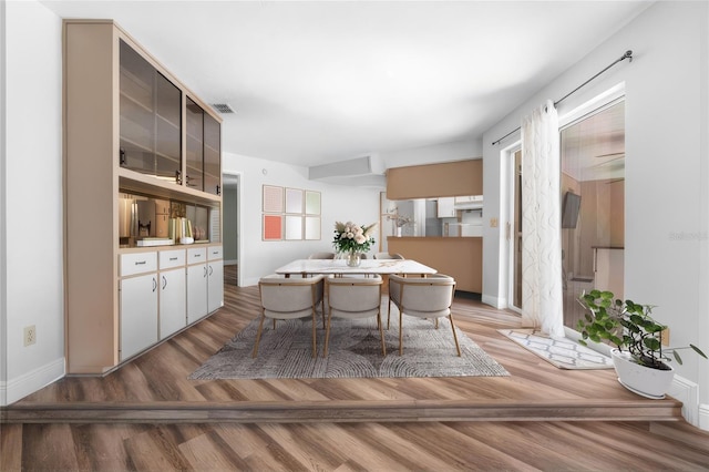 dining room with light hardwood / wood-style floors