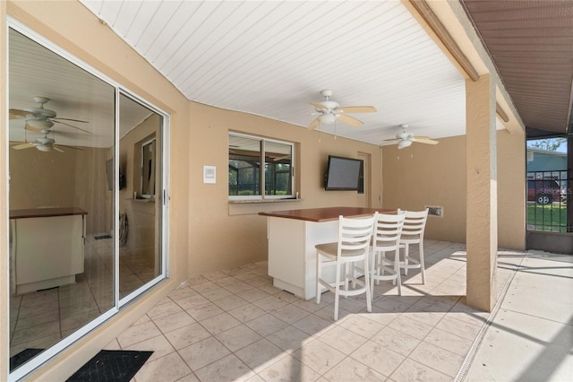 view of patio featuring a bar