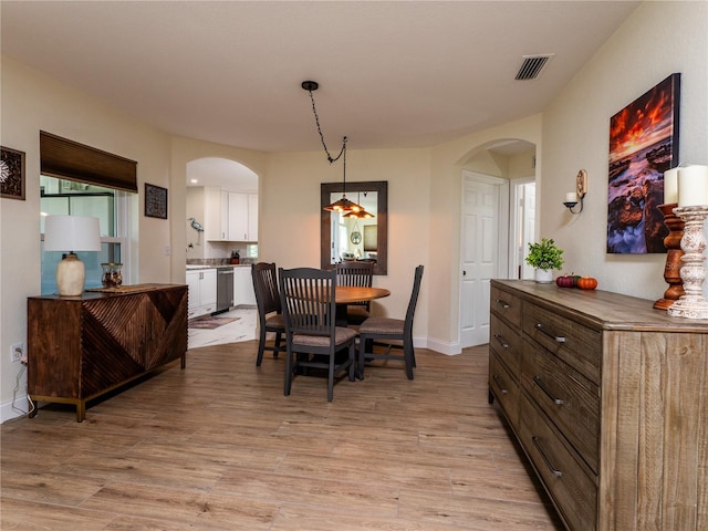 dining space featuring light hardwood / wood-style flooring