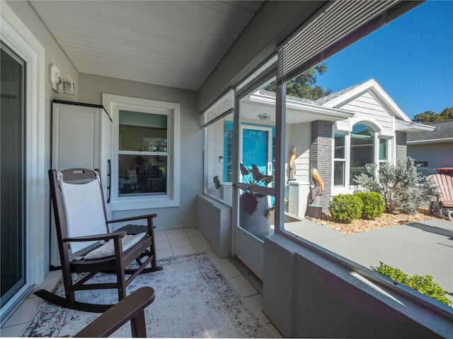 sunroom / solarium featuring a healthy amount of sunlight