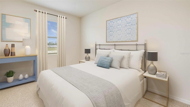 bedroom featuring light colored carpet