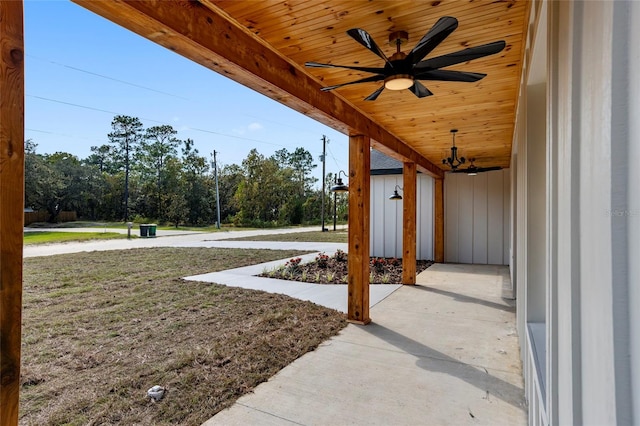 view of yard with ceiling fan