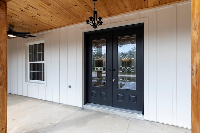 view of exterior entry featuring french doors