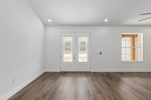 doorway to outside with french doors and dark hardwood / wood-style floors