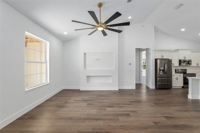 unfurnished living room with ceiling fan, high vaulted ceiling, and dark hardwood / wood-style floors