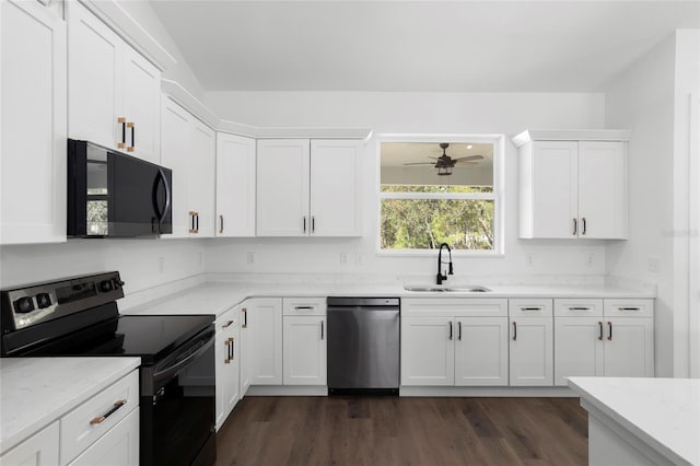 kitchen with dark hardwood / wood-style flooring, ceiling fan, sink, black appliances, and white cabinetry