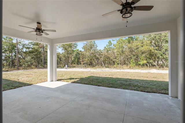 view of patio featuring ceiling fan