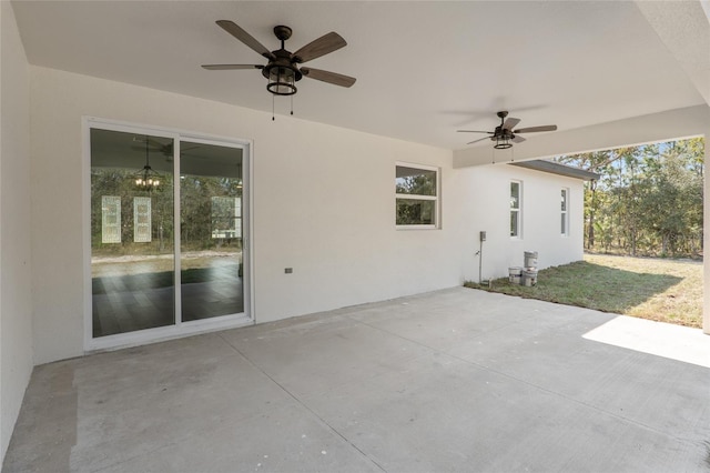 view of patio featuring ceiling fan