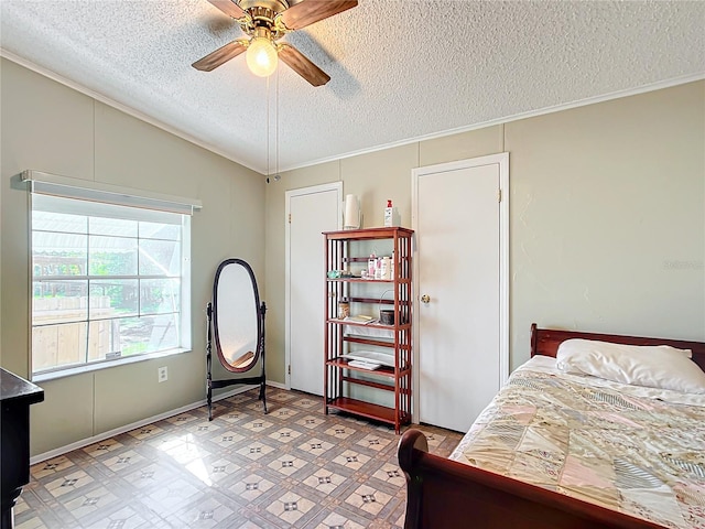 bedroom with crown molding, a textured ceiling, vaulted ceiling, and ceiling fan