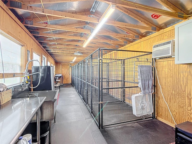 storage room featuring a wall mounted AC