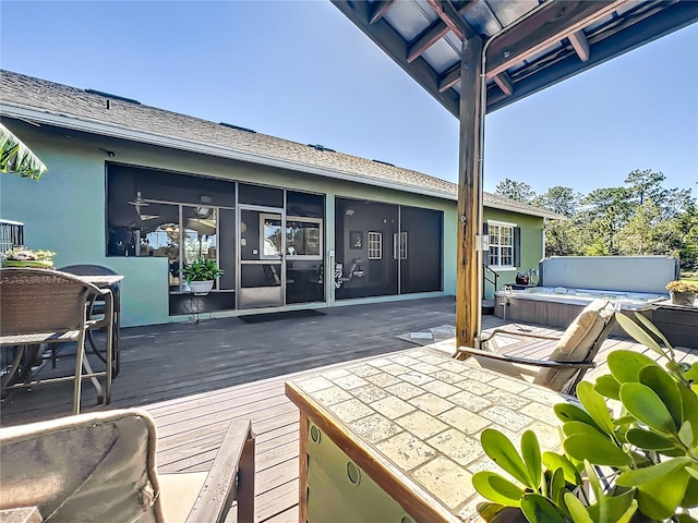 view of patio featuring a hot tub and a wooden deck