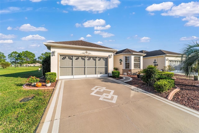 ranch-style home featuring a garage and a front lawn