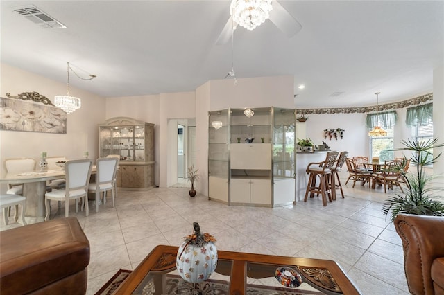 tiled living room with ceiling fan