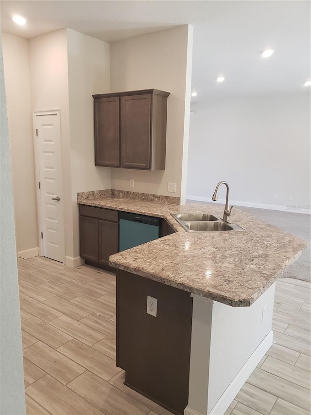 kitchen with sink, dishwasher, kitchen peninsula, dark brown cabinetry, and light hardwood / wood-style flooring