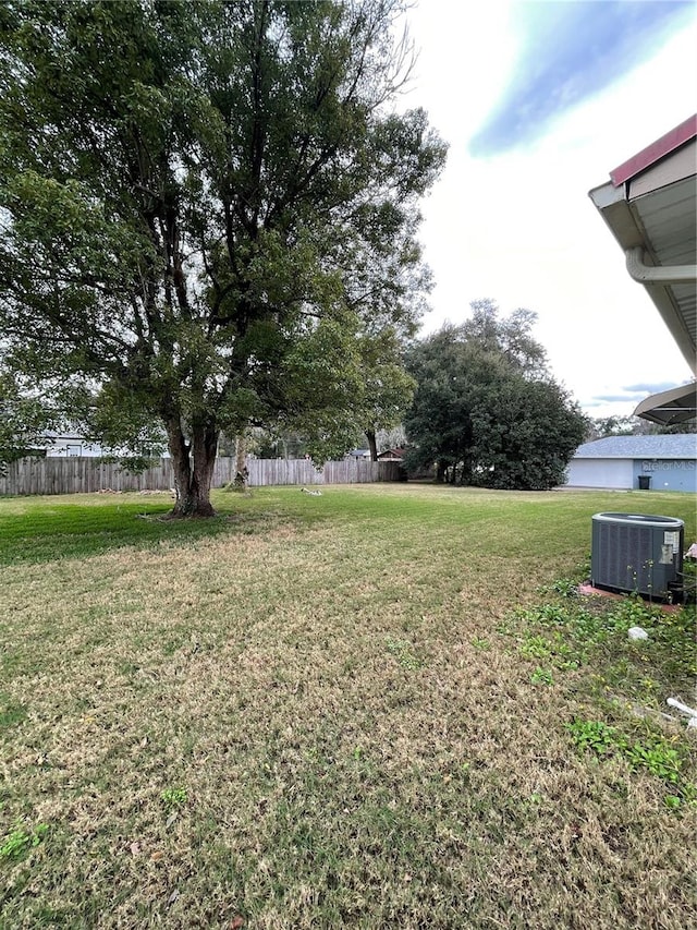 view of yard with central AC