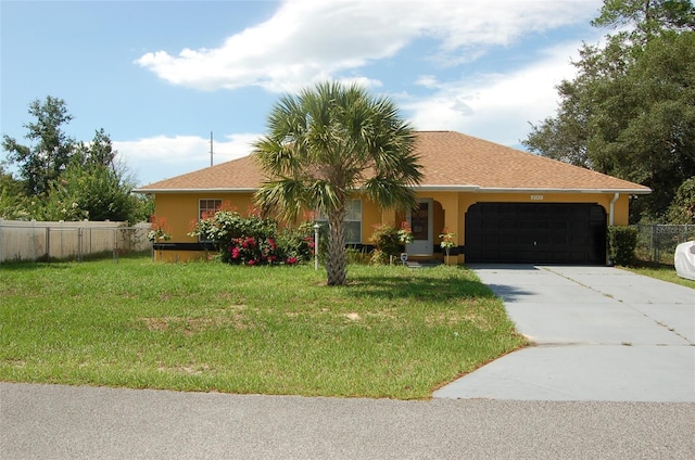 ranch-style house with a front yard and a garage