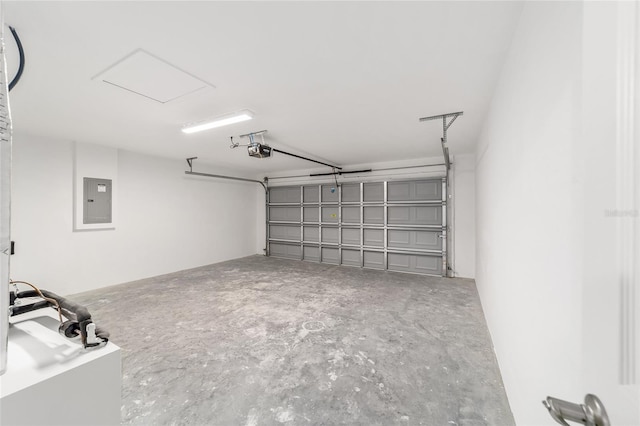 garage featuring a garage door opener and electric panel