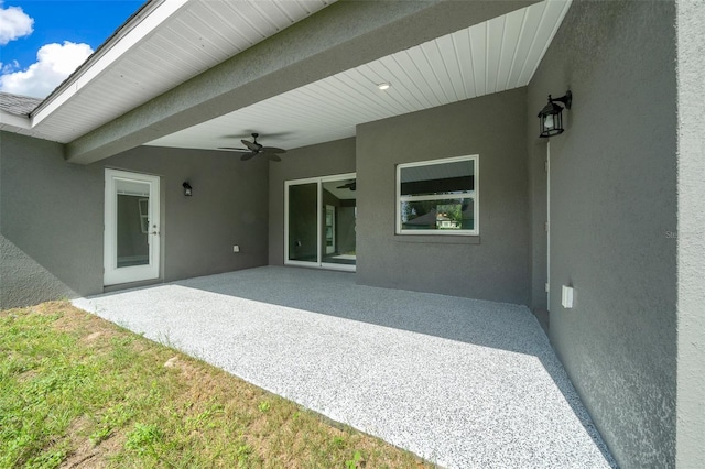 view of patio with ceiling fan