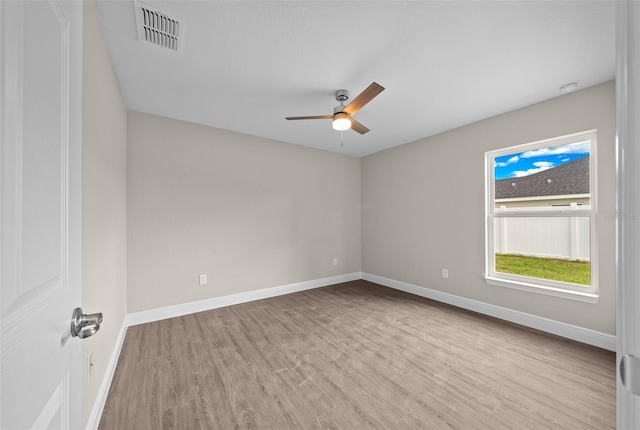 unfurnished room with light hardwood / wood-style floors and ceiling fan