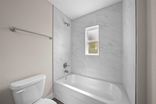 full bathroom with tub / shower combination and toilet