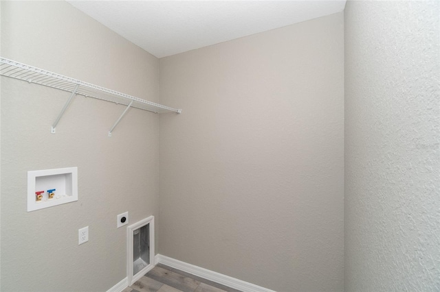 laundry room featuring hookup for an electric dryer, wood-type flooring, and washer hookup