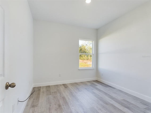 unfurnished room featuring light wood-type flooring