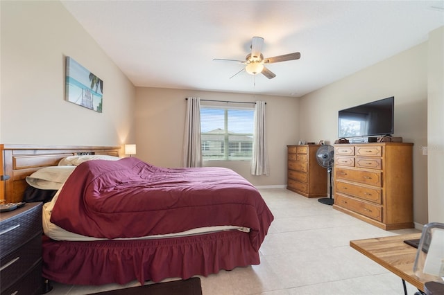 bedroom with light tile patterned floors and ceiling fan