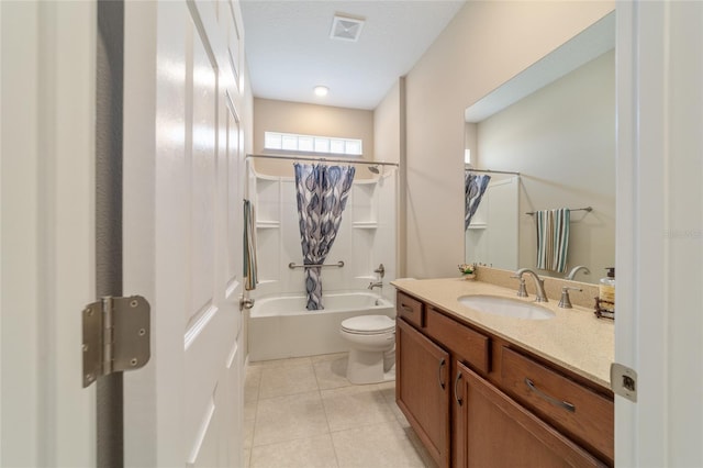 full bathroom with vanity, shower / tub combo, toilet, and tile patterned floors