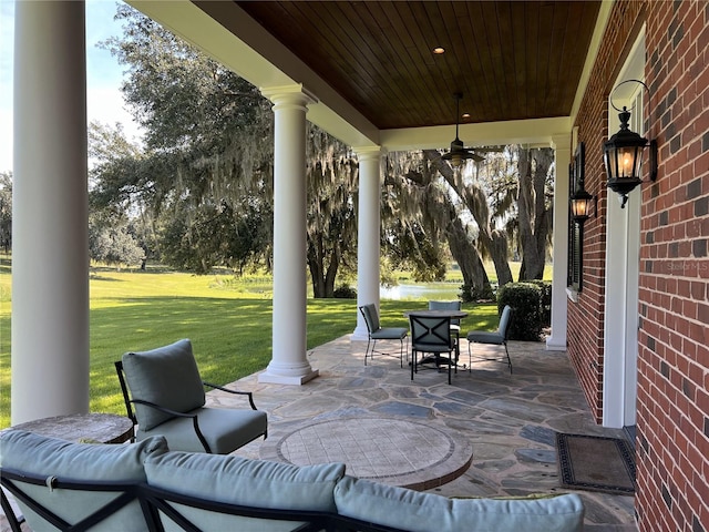 view of patio with a ceiling fan