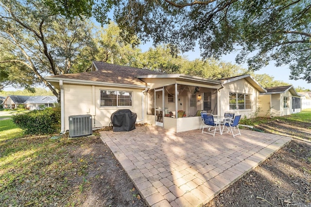 back of house with a patio and central AC