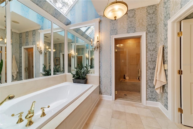 bathroom featuring independent shower and bath, ornamental molding, and tile patterned flooring