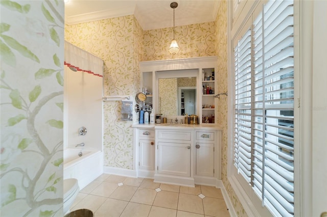 bathroom featuring vanity, a healthy amount of sunlight, and tile patterned flooring