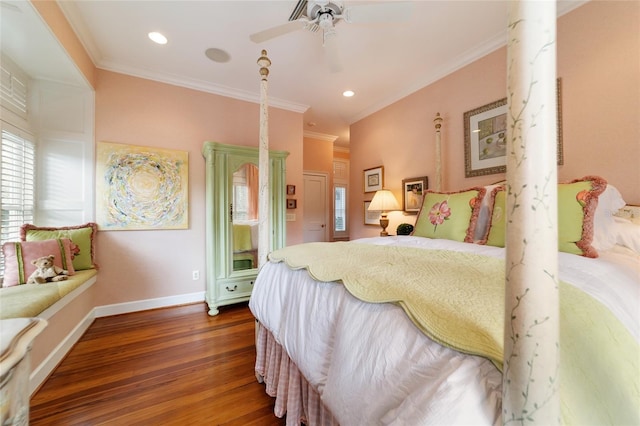 bedroom with ceiling fan, crown molding, and dark hardwood / wood-style flooring