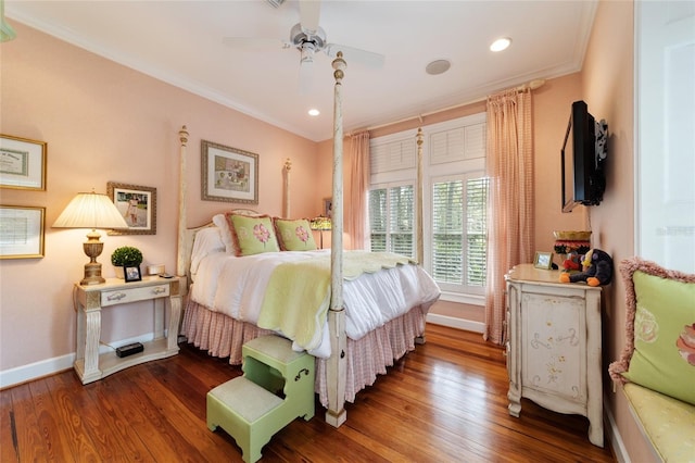 bedroom featuring ornamental molding, wood-type flooring, and ceiling fan