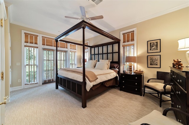 carpeted bedroom featuring access to outside, crown molding, and ceiling fan