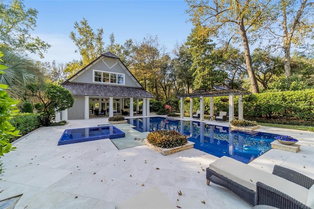 view of swimming pool with a patio and a pergola