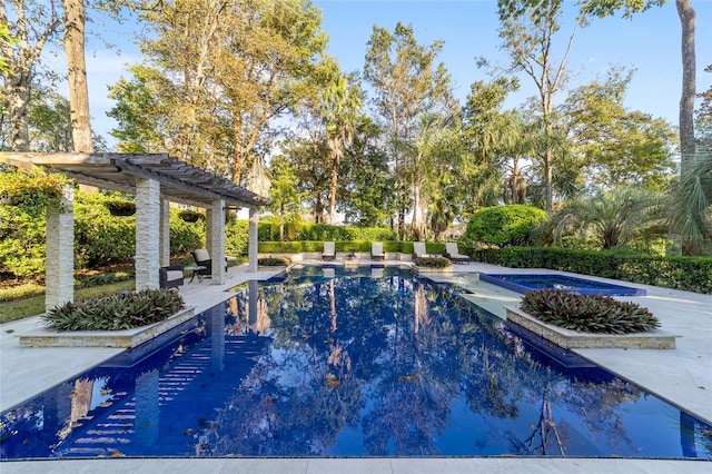 view of swimming pool with a patio area, an in ground hot tub, and a pergola