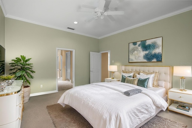 bedroom featuring visible vents, baseboards, carpet flooring, and crown molding