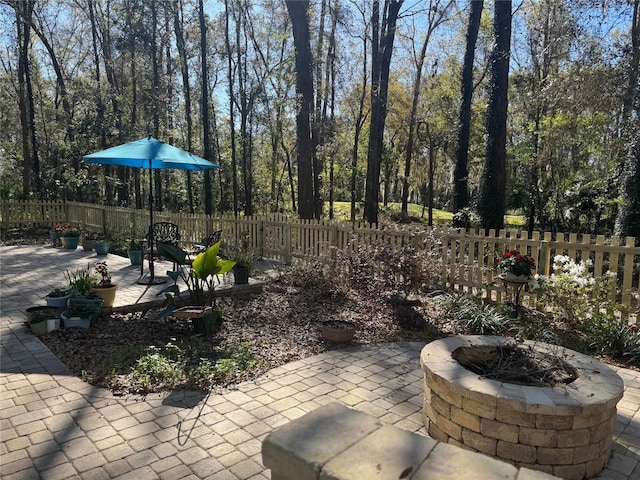 view of patio featuring fence